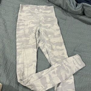 LULU LEGGINGS SIZE 2 USED WITH SMALL MARK NOT ABLE TO SEE $45